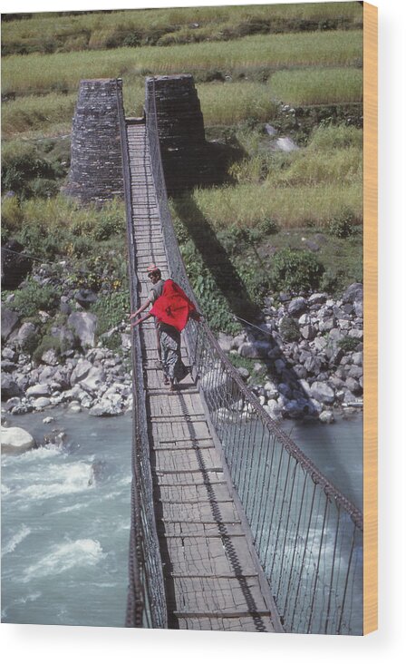 Nepal Wood Print featuring the photograph Crossing a suspension bridge by Steve Estvanik