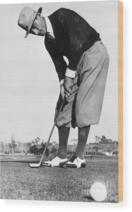 People Wood Print featuring the photograph Golfer Putting by Bettmann