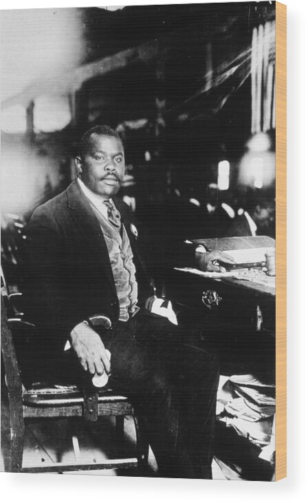 Three Quarter Length Wood Print featuring the photograph Marcus Garvey by Mpi