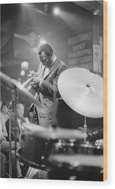 Concert Wood Print featuring the photograph Miles Davis Performing In Nightclub by Bettmann