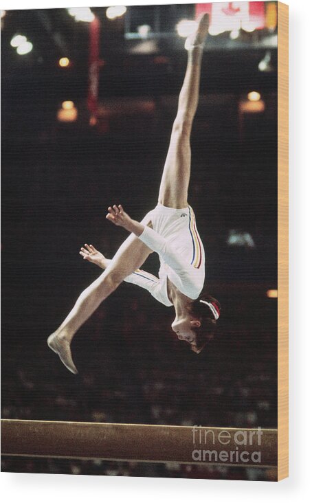 People Wood Print featuring the photograph Nadia Comaneci In Olympic Action by Bettmann