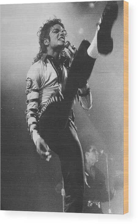 Michael Jackson Wood Print featuring the photograph Pop Star Michael Jackson Gets His Kicks by New York Daily News Archive