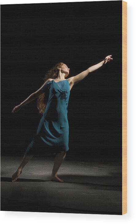 Shadow Wood Print featuring the photograph Young Woman Performing Dance by Pm Images