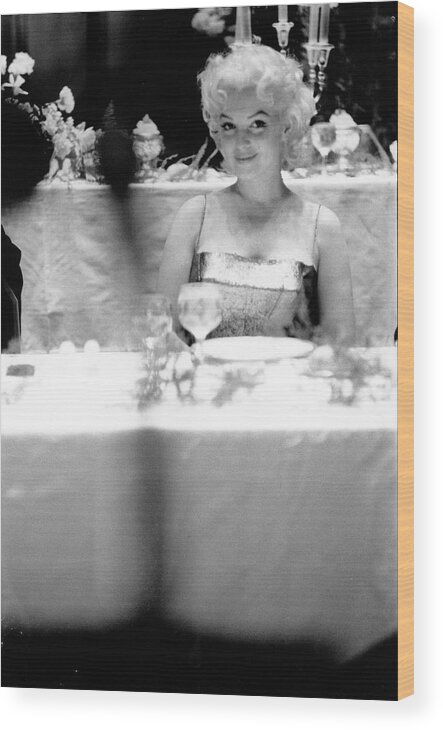 Marilyn Monroe Wood Print featuring the photograph Your Table Awaits by Michael Ochs Archives