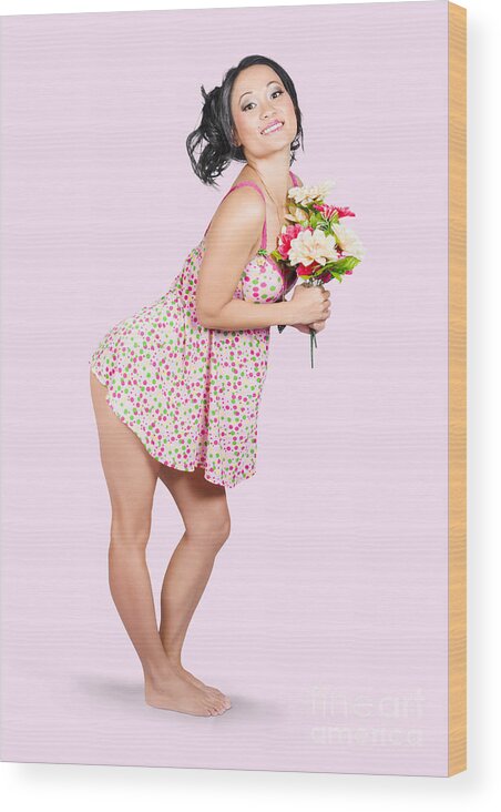 Girl Wood Print featuring the photograph Attractive asian woman holding a flower bunch by Jorgo Photography