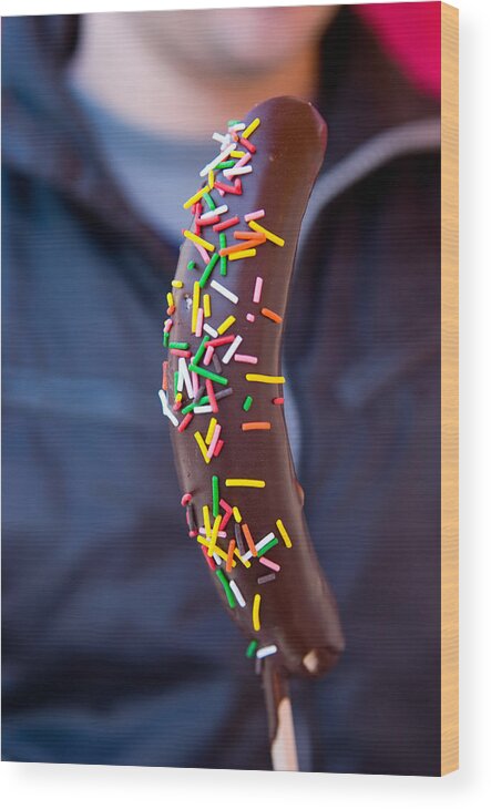 People Wood Print featuring the photograph Chocolate coated banana on stick by © Karen To