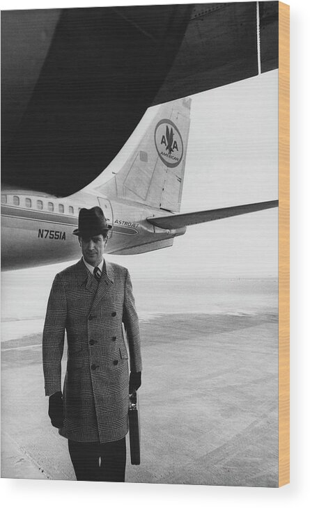 Fashion Wood Print featuring the photograph Model on Tarmac With Airplane by Zachary Freyman