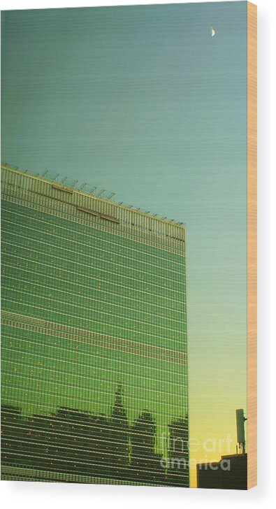 Famous Landmarks Of New York Wood Print featuring the photograph United Nations Secretariat Building with Moon at Sunset by Miriam Danar