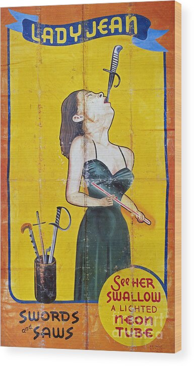 1950s Wood Print featuring the photograph SWORD SWALLOWER, c1955 by Granger