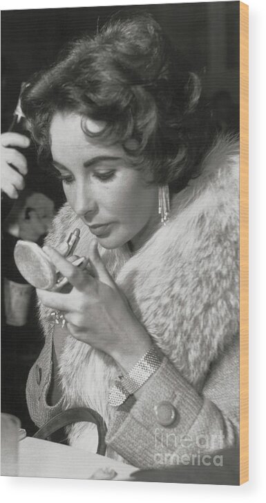 People Wood Print featuring the photograph Actress Elizabeth Taylor Applying by Bettmann