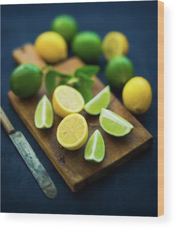 Orange Color Wood Print featuring the photograph Lemons And Limes by Thepalmer