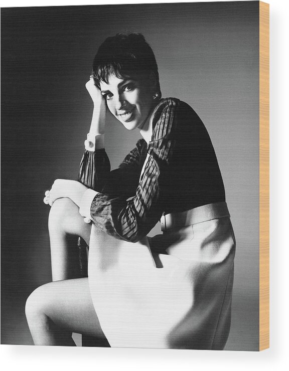 Actress Wood Print featuring the photograph Liza Minnelli Wearing A Gino Charles Dress by Bert Stern