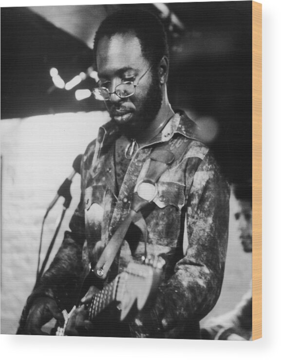 Casual Clothing Wood Print featuring the photograph Curtis Mayfield Performs by Hulton Archive