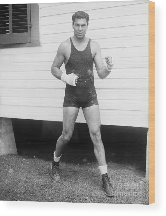 People Wood Print featuring the photograph Jack Dempsey Striking A Fighting Pose by Bettmann