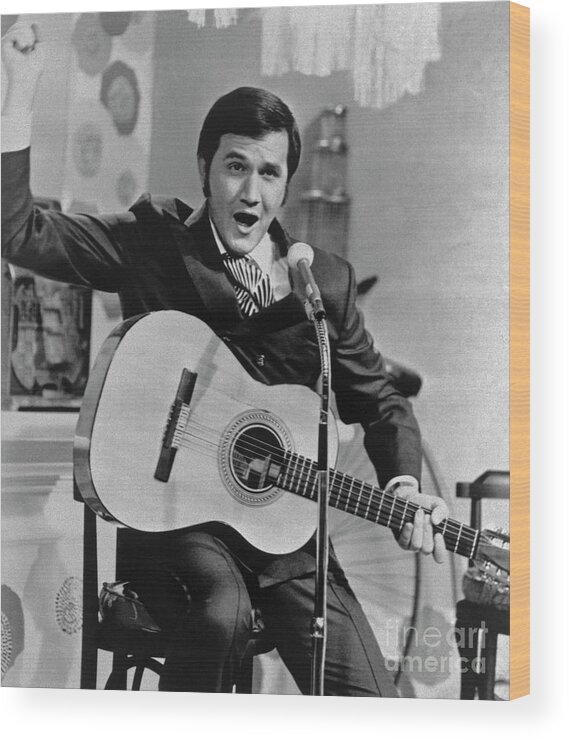 Singer Wood Print featuring the photograph Roger Miller Singing And Playing Guitar by Bettmann