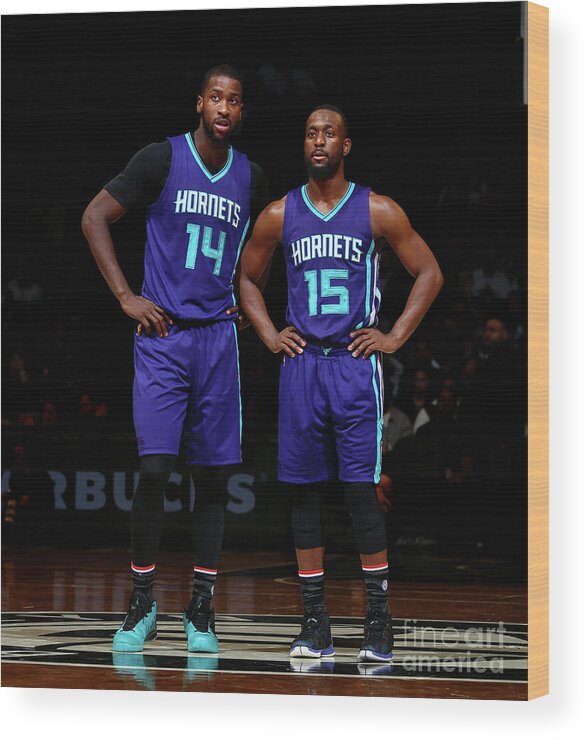 Kemba Walker Wood Print featuring the photograph Kemba Walker and Michael Kidd-gilchrist by Nathaniel S. Butler