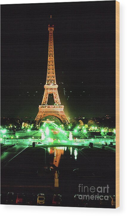 Vue De La Tour Eiffel By Night Wood Print featuring the photograph Vue de la tour eiffel by night Paris France 1978 by Monterey County Historical Society