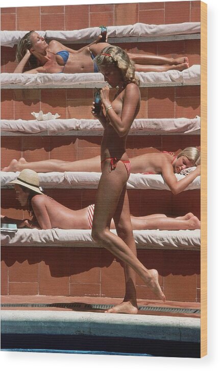 1980-1989 Wood Print featuring the photograph Catherine Wilke by Slim Aarons