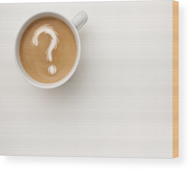White Background Wood Print featuring the photograph A coffee with a question mark drawn in the foam by Anthony Bradshaw