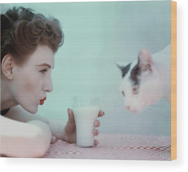 Animal Wood Print featuring the photograph A Model With A Cat by Richard Rutledge