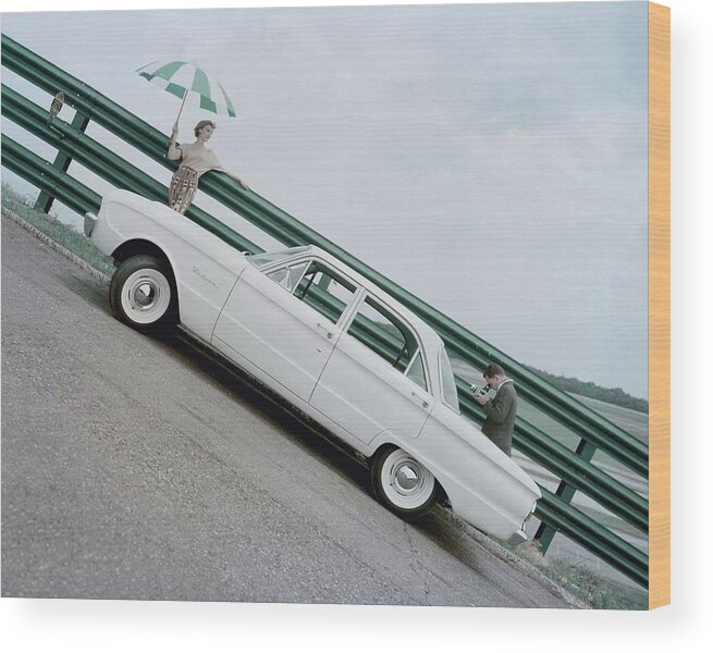Fashion Wood Print featuring the photograph A Model With A Ford Falcon by John Rawlings