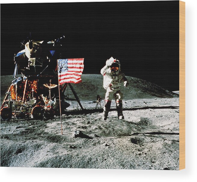 John W Young Wood Print featuring the photograph Astronaut Saluting Us Flag On The Moon by Nasa/science Photo Library