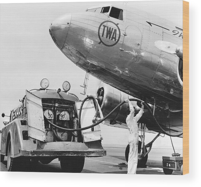 1 Person Wood Print featuring the photograph Fueling A DC-3 Airliner by Underwood Archives