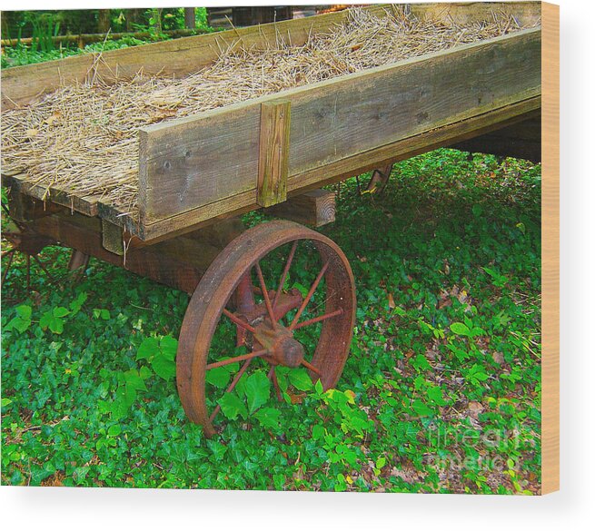 Wagon Wood Print featuring the photograph Rusted Wagon Wheel by Val Miller