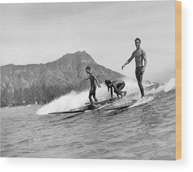 16-20 Years Wood Print featuring the photograph Surfing In Honolulu by Underwood Archives