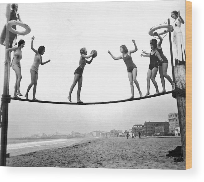 1929 Wood Print featuring the photograph Women Play Beach Basketball by Underwood Archives