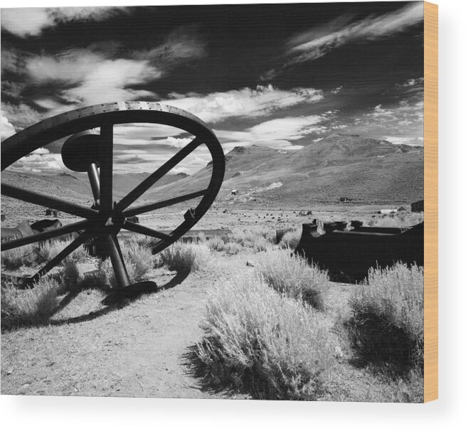 Ghost Town Wood Print featuring the photograph Big Wheel Bodie #1 by Jan W Faul