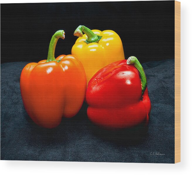 Vegetable Wood Print featuring the photograph The Three Peppers by Christopher Holmes