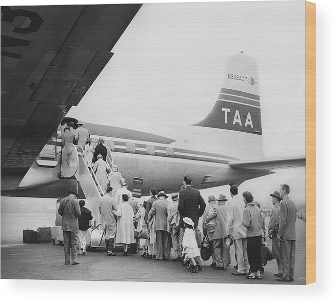 1950s Wood Print featuring the photograph Passengers Boarding Airplane #1 by Underwood Archives
