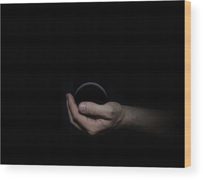 Black Wood Print featuring the digital art Black Sphere in Hand by Pelo Blanco Photo