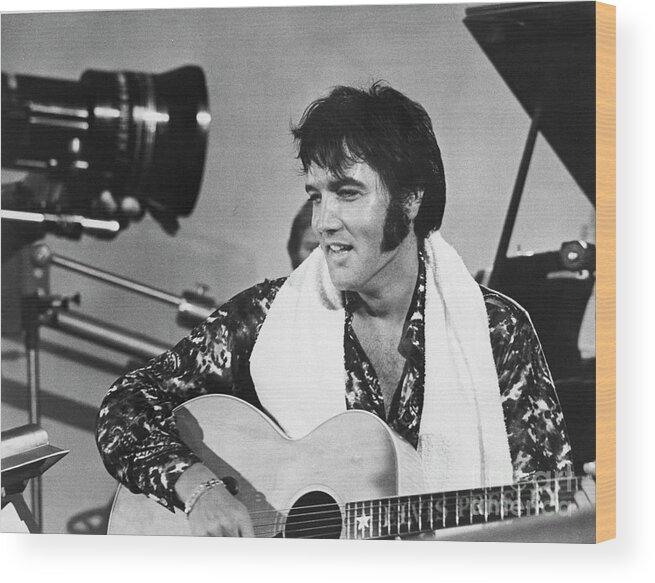 Rock Music Wood Print featuring the photograph Elvis Presley With Guitar #1 by Bettmann