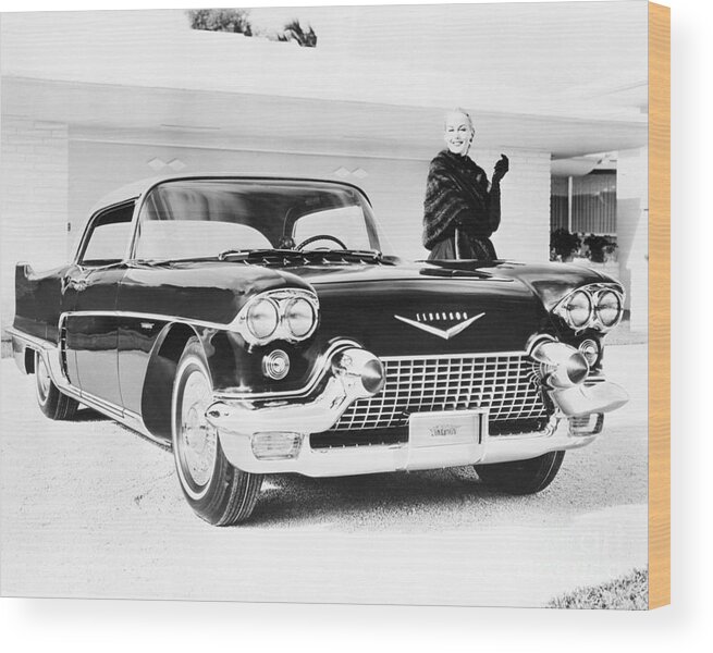 Mid Adult Women Wood Print featuring the photograph 1957 Cadillac Eldorado Brougham by Bettmann