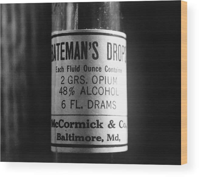 Bateman's Drops Wood Print featuring the photograph Antique McCormick and Co Baltimore MD Bateman's Drops Opium Bottle Label - Black and White by Marianna Mills