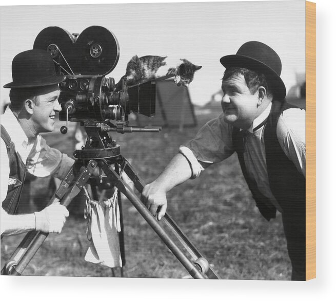 Oliver Hardy Wood Print featuring the photograph OLIVER HARDY and STAN LAUREL in THE FINISHING TOUCH -1928-. #4 by Album