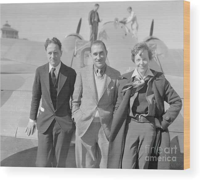 People Wood Print featuring the photograph Amelia Earhart, Harry Manning, And Paul by Bettmann