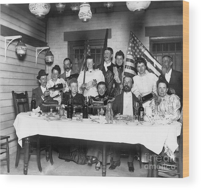 Mature Adult Wood Print featuring the photograph American Family Pouring Liquor by Bettmann