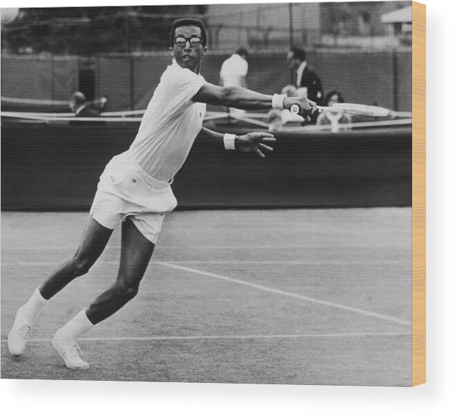 Young Men Wood Print featuring the photograph Arthur Ashe In London by Hulton Archive