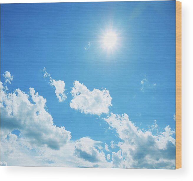 Blue Sky And Sun Wood Print by Bgfoto 