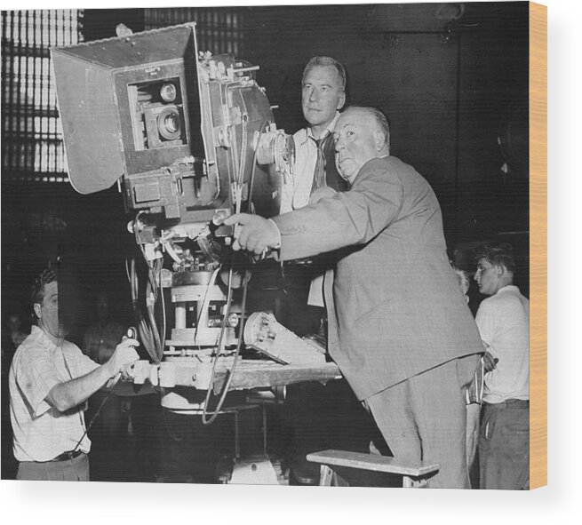 1950-1959 Wood Print featuring the photograph Bob Burke And Alfred Hitchcock Right On by New York Daily News Archive