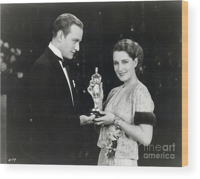 3rd Annual Academy Awards Wood Print featuring the photograph Conrad Nagel Presents Oscar To Norma by Bettmann