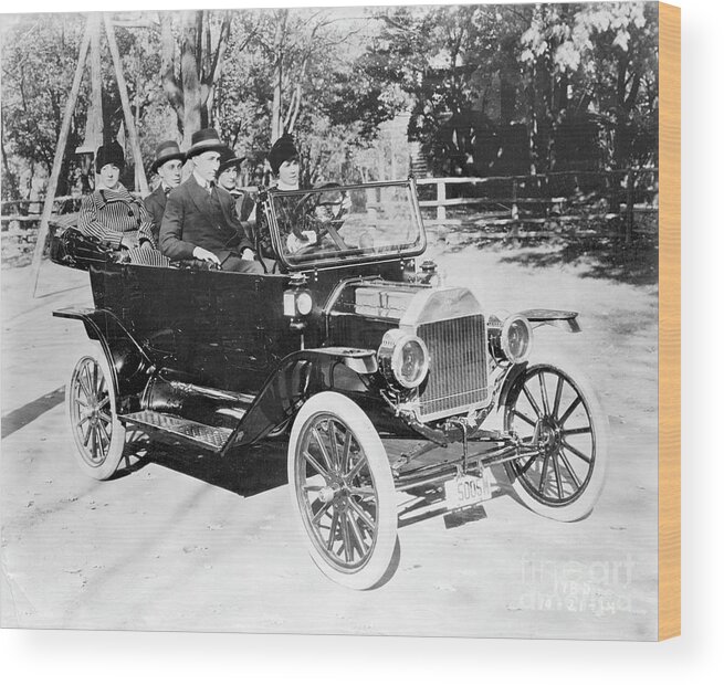 Young Men Wood Print featuring the photograph Couples Riding In Model T Ford by Bettmann