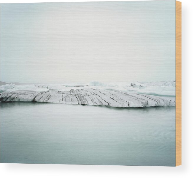 Scenics Wood Print featuring the photograph Ice Melt In Jökulsárlón, Iceland by Michael Hall