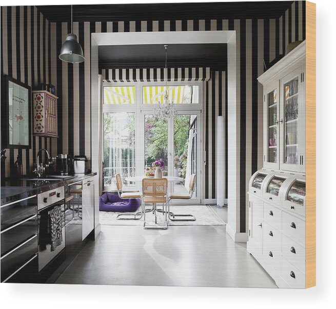 Kitchen With Black And White Striped Wallpaper, Modern Kitchen Counter And  Retro Dresser Painted White; Dining Area With Cantilever Chairs In  Background Wood Print by Maria Gibert - Pixels