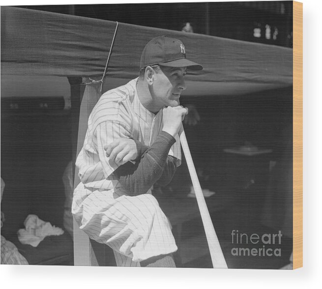 People Wood Print featuring the photograph Lou Gehrig Leaning On Baseball Bat by Bettmann