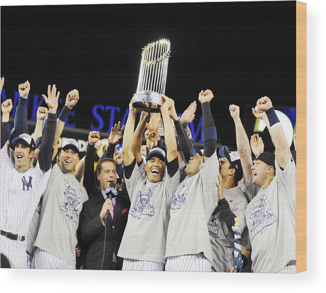 American League Baseball Wood Print featuring the photograph Mariano Rivera Holds Trophy As New York by New York Daily News Archive