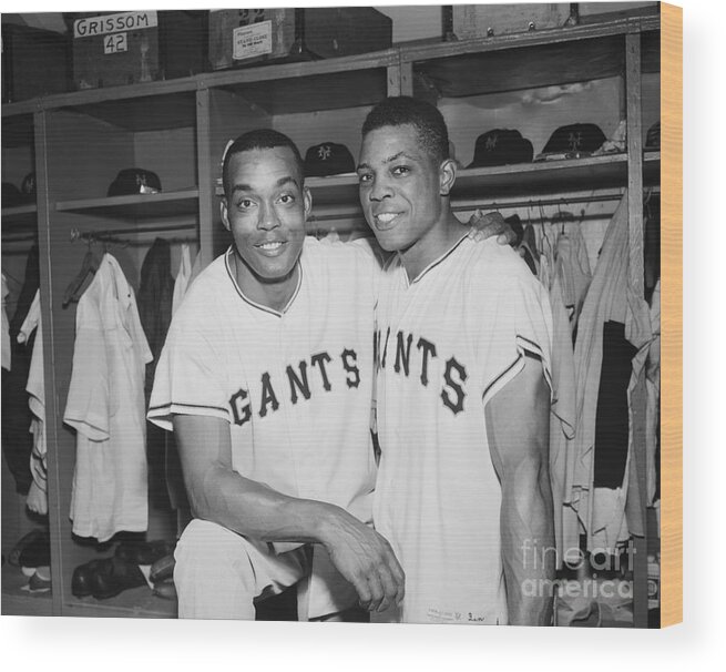 Second Inning Wood Print featuring the photograph Mays, Monte Irvin Embracing In Dressing by Bettmann